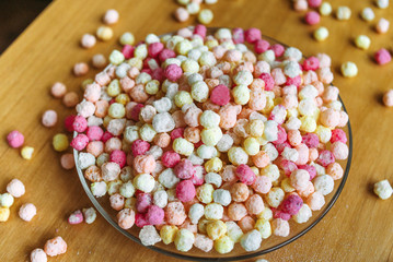 color white yellow beige pink balls in glass plate 2