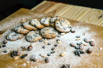 cookies with chocolate and nuts black background