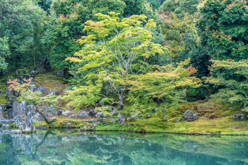 Beautiful Sogenchi Garden at Tenryu-ji temple in Arashiyama, Kyoto. Lake reflections..Designated as a Special Place of Scenic Beauty and UNESCO World Heritage Site