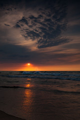 Orange sunset with Reflected Clouds