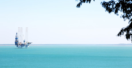  an off shore platform in the clear  ocean