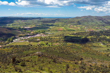 Fototapeta na wymiar Aerial view on a Portuguese village hills and fields