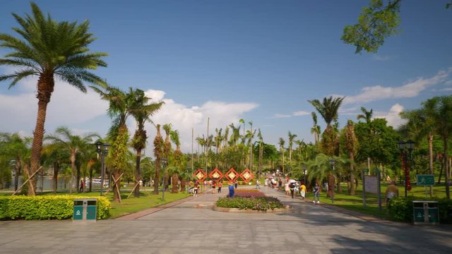 sunny day zhuhai city famous park entrance alley walking panorama 4k china
