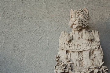 A West Highland Terrier Stone look garden ornament with a 