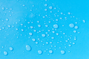 Blue background with water droplets