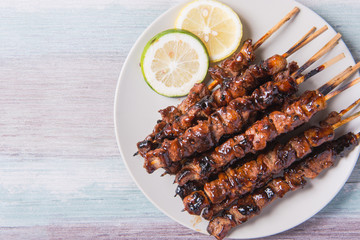 pork barbecue with peanut sauce, vinegar sauce and yoghurt sauce