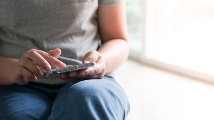 Woman hands touching and using mobile smartphone , lifestyle concept