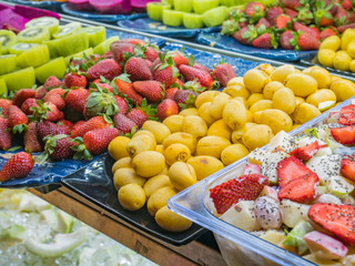 Assorted Fresh Fruits and Fruit Salad with Yoghurt in Storefront