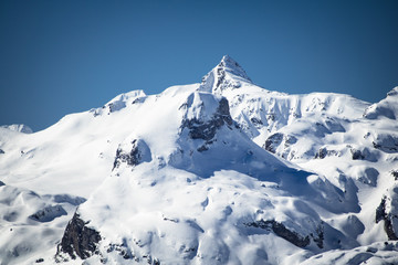 Fototapeta na wymiar view on beautiful snowcapped rocky mountain range in pyrenees, france