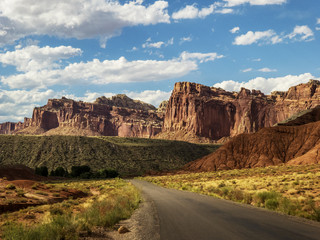 Highway leading to red rock cliffs