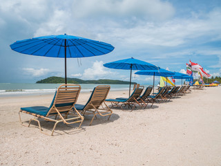 Obraz na płótnie Canvas Beach Chair with Umbrella in Cenang Beach Langkawi, Malaysia