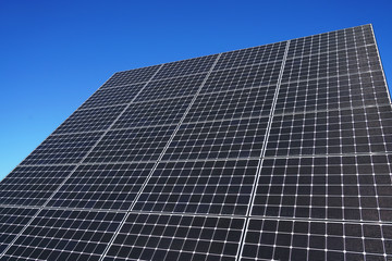 Fototapeta premium Close up on solar panel and blue sky