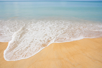 Fototapeta na wymiar wave on sand beach