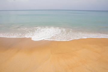Fototapeta na wymiar wave on sand beach