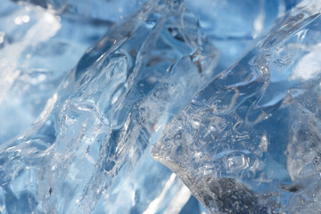 Obraz na płótnie Canvas blue ice pieces macro