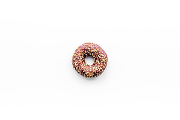 Unhealthy tasty sweets. Glazed donut on white background top view copy space
