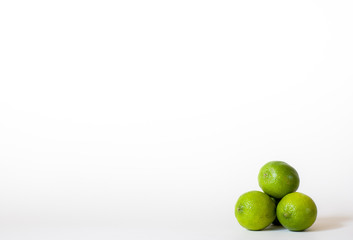 Three limes in a pile