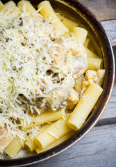Fresh pasta with meat, mushrooms and cheese. Selective focus.