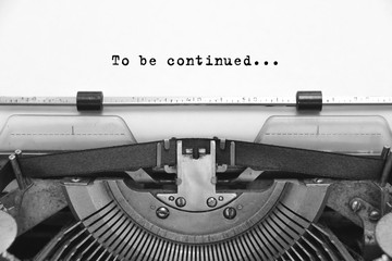 To be continued... text typed words on a old Vintage Typewriter. Close up.