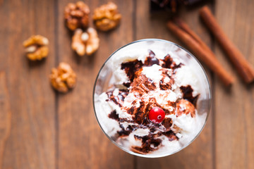 Ice cream sundae, spices and walnuts