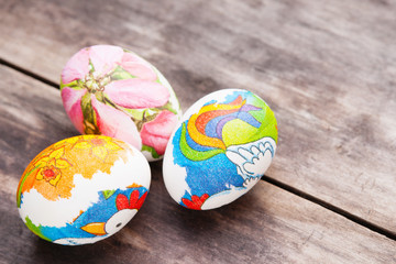 Easter eggs on wooden background 