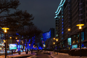 Fototapeta na wymiar Night, city illumination of buildings and streets.