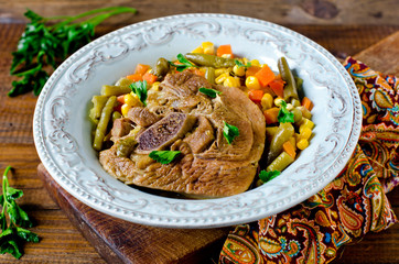 Thigh of turkey stew with vegetables: corn, green beans, carrots and bell pepper