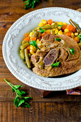 Thigh of turkey stew with vegetables: corn, green beans, carrots and bell pepper