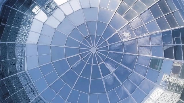 Aerial view on Modern glass building dome. glass dome background. glass roof in building. Top view on Modern radial glass dome of a modern building