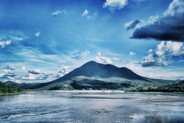 River with mountains and beautiful sky.