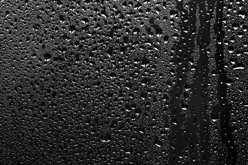 texture of a drop of rain on a glass wet transparent background