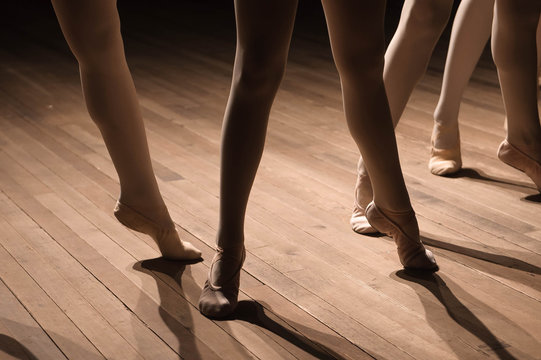 Close Up Of Feet In Children's Ballet Dancing Class