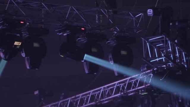 Entertainment, concert, colorful lights and stroboscopes glow in the club.
