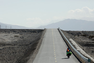 bicycle traveler in Tibet