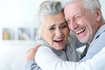 happy senior couple at home