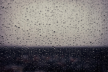 Rain drops on the window, Drops on glass background sadness