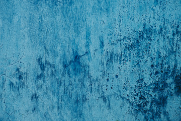 Closeup picture of an old metal painted in blue