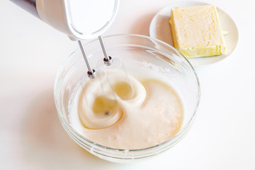 mixer for the dough on white table