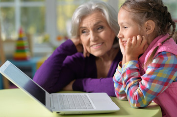 portrait of happy grandmother and daughter 