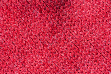 Texture of knitted red sweater