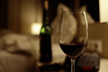 A glass of red wine  bedroom