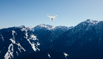 Fototapeta premium drone flying over winter mountain top