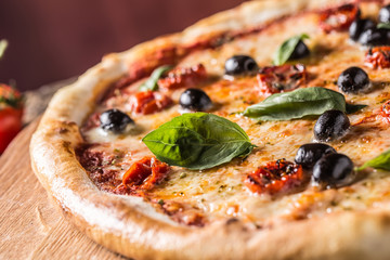 Pizza. Tasty fresh italian pizza served on old wooden table