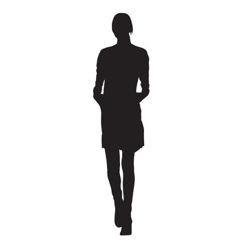 Slim young lady walking in spring coat. Hands in pockets. Isolated vector silhouette