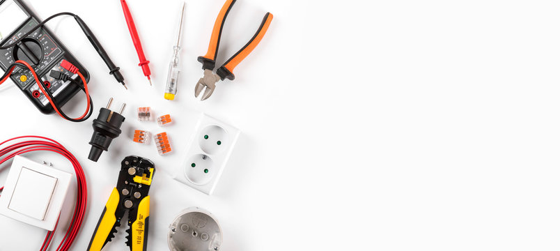 electrician equipment on white background with copy space. top view