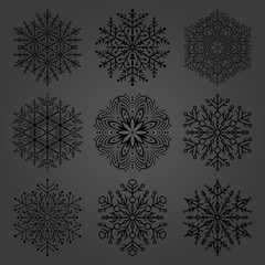 Set of vector dark snowflakes. Fine winter ornaments. Snowflakes collection. Snowflakes for backgrounds and designs