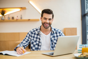 Fototapeta premium Handsome smart man working