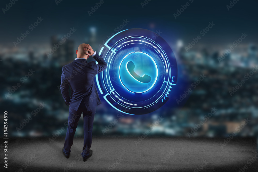 Poster businessman in front of a wall with a shinny technologic phone button - 3d render