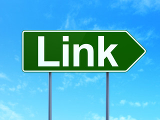 Web development concept: Link on green road highway sign, clear blue sky background, 3D rendering