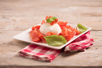 Caprese Salad. Mozzarella Cheese salad with tomato and basil